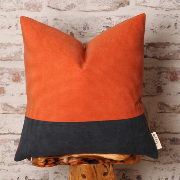 orange and navy pillow